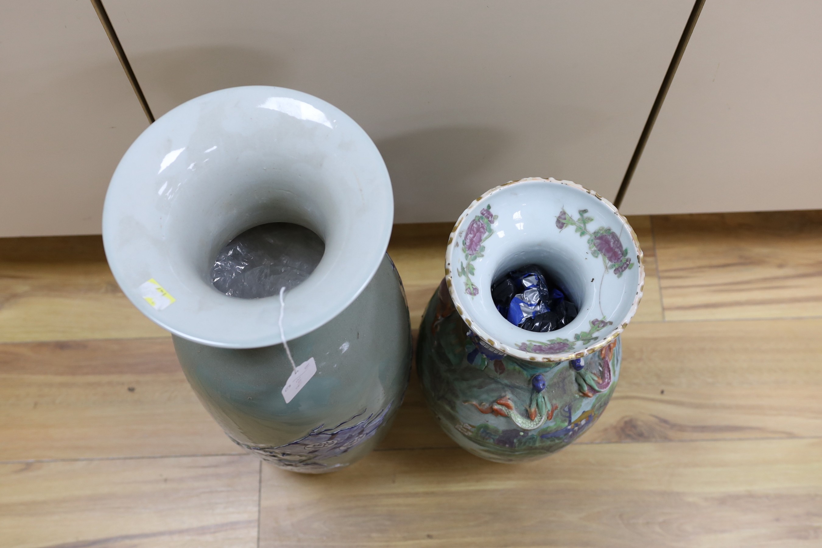 A Chinese enamelled porcelain vase and an underglaze and copper red large celadon glazed vase, tallest 57.5cms high (2)